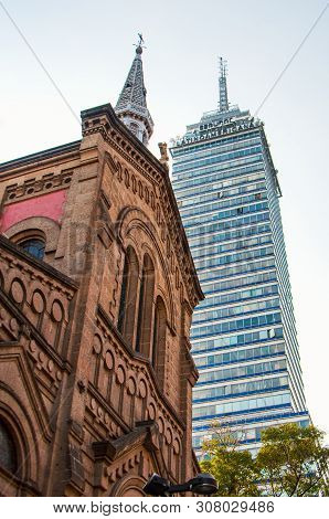 Latinoamerican Tower And Temple Of St. Felipe In Mexico City, Mexico. Present Vs History
