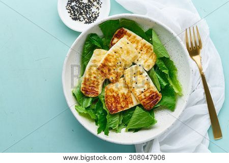 Keto Ketogenic Diet Grilled Haloumi With Lettuce, Mediterranean Cuisine On Pastel Background