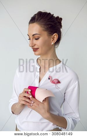Young Attractive Beautician Aesthetician Woman In White Shirt