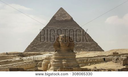 The Front Of The Sphinx And Pyramid Of Khafre At Giza Near Cairo
