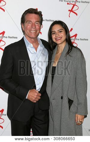 LOS ANGELES - JUN 23:  Peter Bergman, Sasha Calle at the Young and The Restless Fan Club Luncheon at the Marriott Burbank Convention Center on June 23, 2019 in Burbank, CA