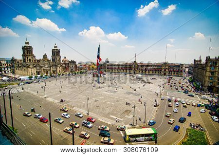 Mexico City, Mexico - April 12, 2012. Main Square Zocalo With Cathedral And Big Mexican Flag
