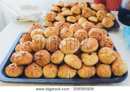 Preparation Of Belyashes. Traditional Russian Meat Pies Belyashi. Belyashes On A Table. Russian, Bas