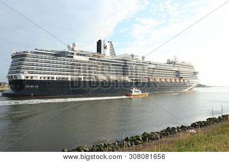 Ijmuiden, The Netherlands -june, 9th 2019: Nieuw Statendam Leaving Ijmuiden Sea Lock, Joined By Pilo