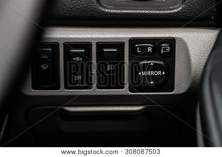 Novosibirsk, Russia - June 18, 2019:  Toyota Opa, Close-up Of The  Buttons: Side Mirror,  Headlight 