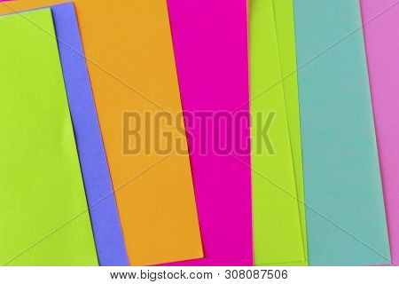 Blue, Pink, Yellow, Purple, Green, Orange Neon Paper Color For Background. Striped Geometric Pattern