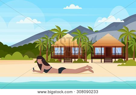 Bikini Woman Sunbathing Girl In Swimsuit Using Smartphone Social Media Communication Summer Vacation