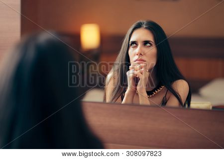 Sad Depressed Woman Crying In The Mirror