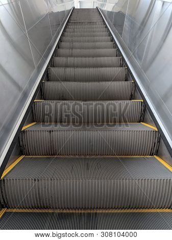 Jakarta, Indonesia - June 17, 2019: Escalator at Kelapa Gading Boulevard Utara LRT Station.