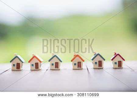 Mini House On The Table,   Mortgage, Savings Money For Buy House And Loan To Business Investment For