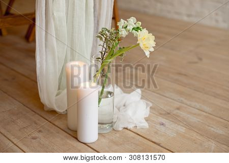 Branch Of Blooming White Peony Tulip Mattiola Branch In A Glass Vase White Wax Candles Stand On The 
