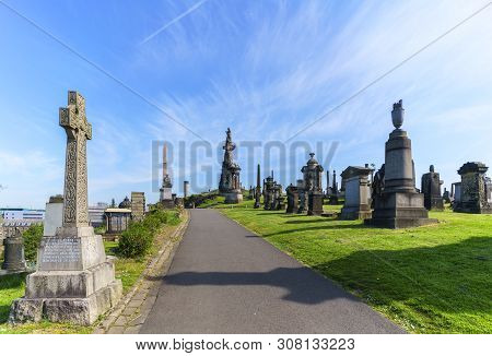 Glasgow , Scotland - May 15 , 2019 : Glasgow Necropolis Is A Victorian Cemetery On A Low Hill Near G