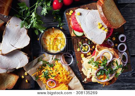 Elicious Homemade Sandwiches With Juicy Slices Of Organic Ham, Tomato, Cucumber, Cheddar Cheese Sauc