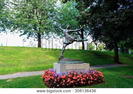 Oslo, Norway: May 1, 2019 - Statue Of Sonja Henie With Monument In Oslo - Norway