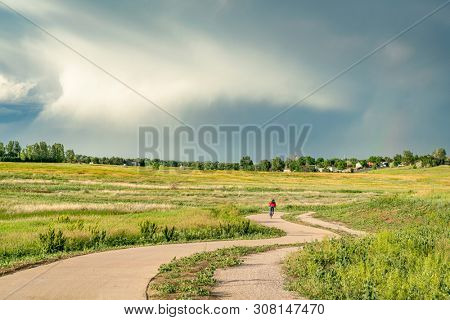 Newly constructed regional trail - Longview Trail connecting Loveland and Fort Collins along northern Colorado foothills, early summer scenery