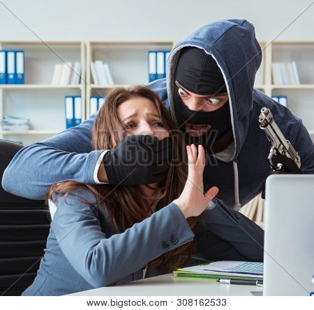 Criminal taking businesswoman as hostage in office