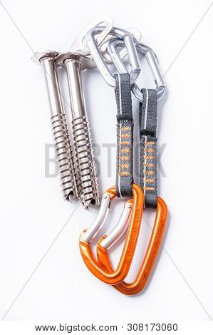 Ice Screws And Quickdraw On A White Background. Equipment Ice Cl