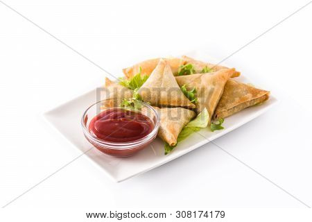 Samsa Or Samosas With Meat And Vegetables Isolated On White Background . Traditional Indian Food.