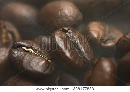Arabica Coffee Beans. Coffee Background. Roasted Coffee Beans.