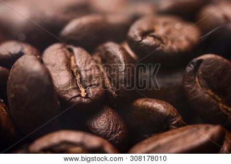 Mixture Of Different Kinds Of Coffee Beans. Coffee Background. Roasted Coffee Beans.