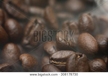 Robusta Coffee Beans. Composition Of Smoke Coffee Beans. Coffee Beans Background