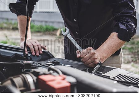 Services Car Engine Machine Concept, Automobile Mechanic Repairman Hands Repairing A Car Engine Auto