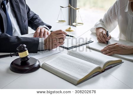Consultation And Conference Of Professional Businesswoman And Male Lawyers Working And Discussion Ha