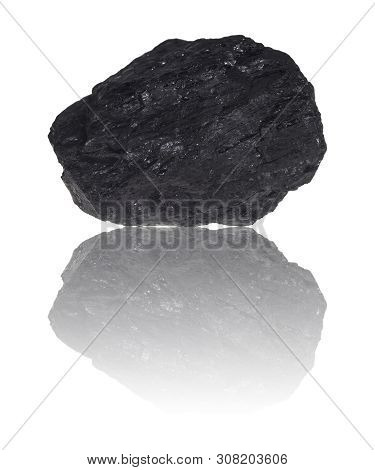 A Piece Of Coal Before Exemptly White Background.
