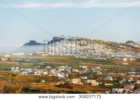 Santorini Sunrise. Beautiful View Of Thira, Skaros Rock At Village Of Imerovigli And Foggy Morning S