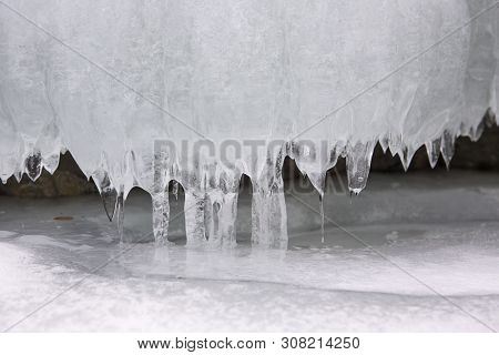 Slots Of Little Thin With Tiny Icicles Dripping Spring