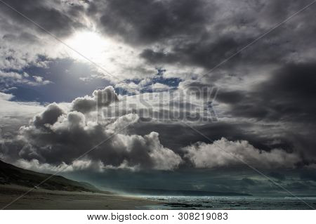Stormy Dark Overcast Ocean Coastline With Sunshine, Mossel Bay, South Africa