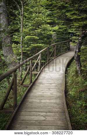 Nice Wooden Path Of Aigüestortes I Estany De Sant Maurici National Park In A Spanish Pyrenees Mounta