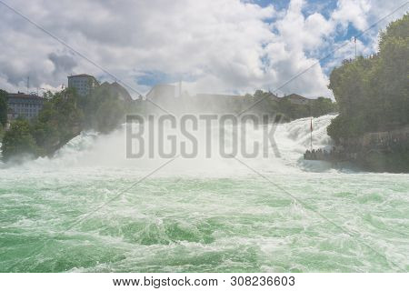 Neuhausen Am Rheinfall, Switzerland - 23 July 2019. Waterfall On The River Rhine In The City Neuhaus