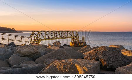 A Rocky Breakwater Overlooking The Gulf Of Gdansk Near The Beach At Westerplatte. Gdansk, Poland