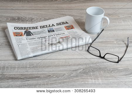 Italy, 2018.  A View Of The Corriere Della Sera Italian Newspaper And A Coffee Cup  On The Table