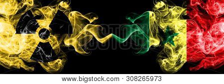 Senegal, Senegalese Vs Nuclear Smoky Mystic Flags Placed Side By Side. Thick Colored Silky Smokes Co