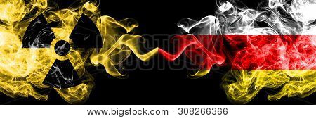 South Ossetia Vs Nuclear Smoky Mystic Flags Placed Side By Side. Thick Colored Silky Smokes Combinat
