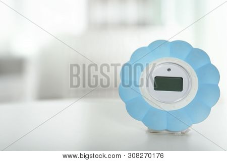 Digital Temperature And Humidity Control In Baby Room Interior. Space For Text