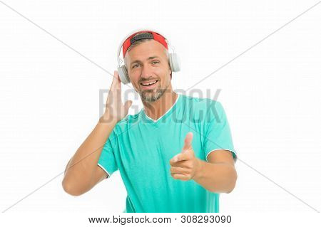 Wireless Headphones For Sport. Modern Headphones Concept. Man Handsome Unshaven Sportsman Listening 