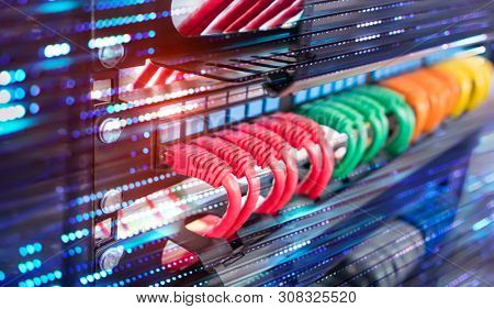 network cable connecting on network core switch close up