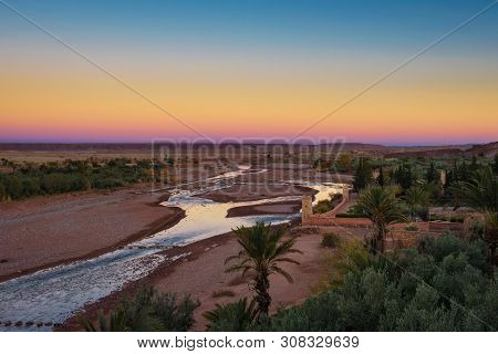 Asif Ounila River At Ait Benhaddou In Morocco Seen At Sunset. This Fortified City Was Built Along Th
