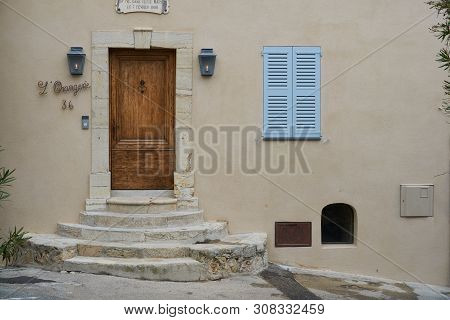 Mougins, France - April 03, 2019: The Sign With French Text Over The Door Says That Commander Lamy W