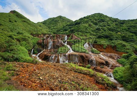 Golden Waterfall. Nature Landscape Of Jinguashi In Ruifang Area. It Is Located In New Taipei City, T
