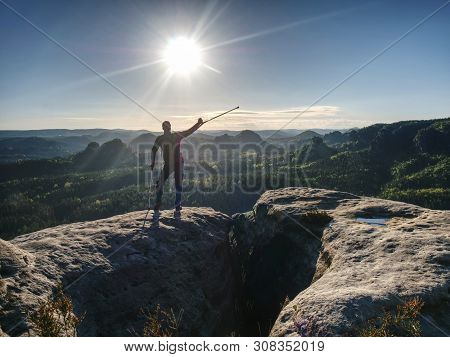 Man With Crutches And Strong Will. Disabled Tourist Successfully Climb  In Park. Hiker Man Is Celebr