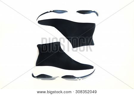 Pair Of Black And White Knitted Sneakers. Popular Trendy Shoes. Top View