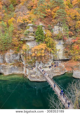 Rope Bridge Cross To Vibrant Cliff With Mirror Lake In To-no-hetsuri - Shimogo, Fukushima, Japan