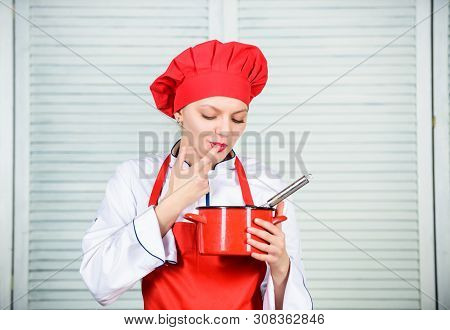 Butter Cream. Use Hand Whisk. Woman Chef Hold Whisk And Pot. Girl In Apron Whipping Eggs Or Cream. S