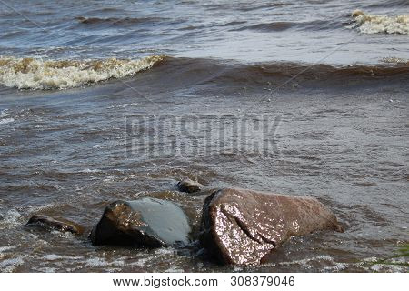 Picturesque, Large Lake With Waves And Shore