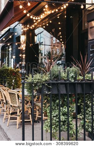 London, Uk - June 5, 2019: Exterior Of A Restaurant Decorated With Lights In Fitzrovia, Diverse Area