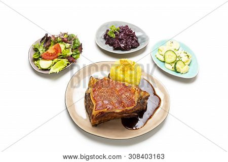 Grilled Frankonian Schaeufele With Dumpling On White